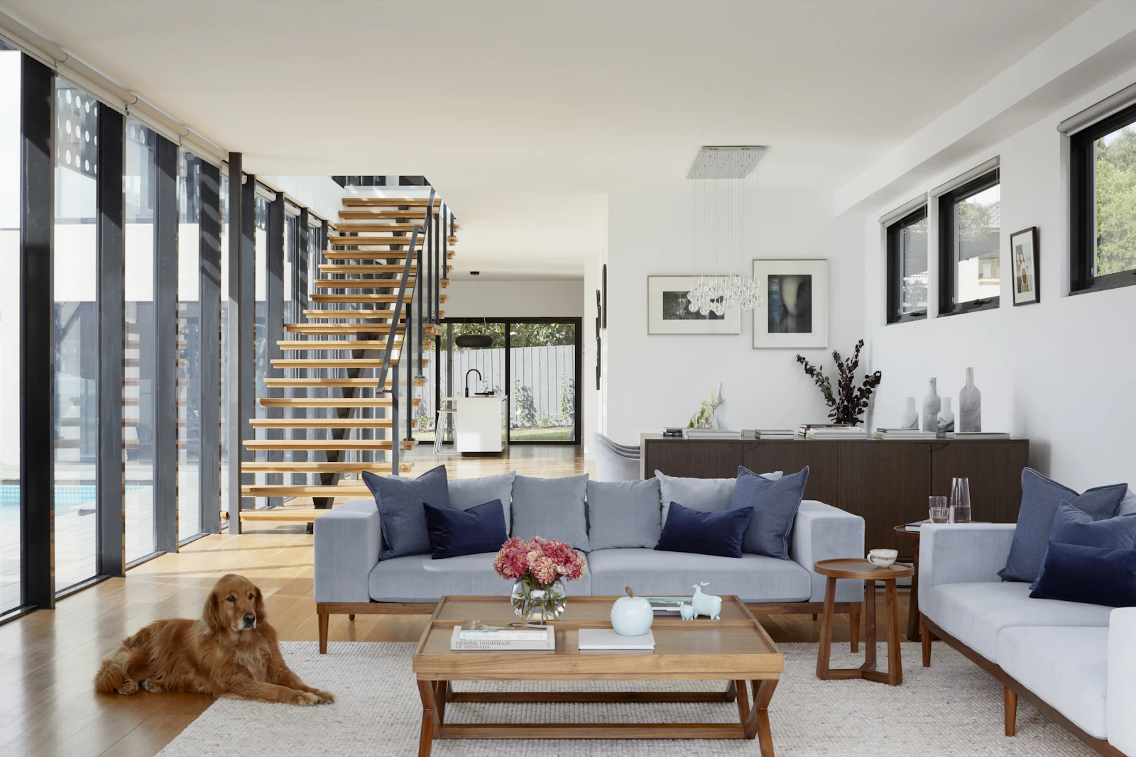 Placeholder photograph of a living room with an open timber stair