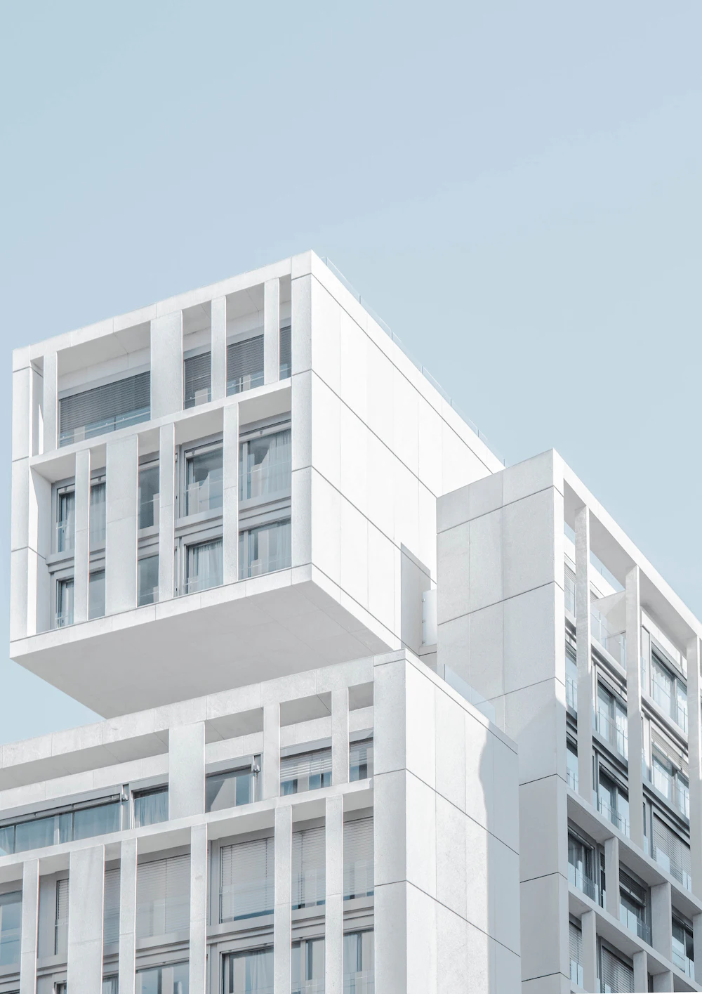 Placeholder photograph of a pale stone office building