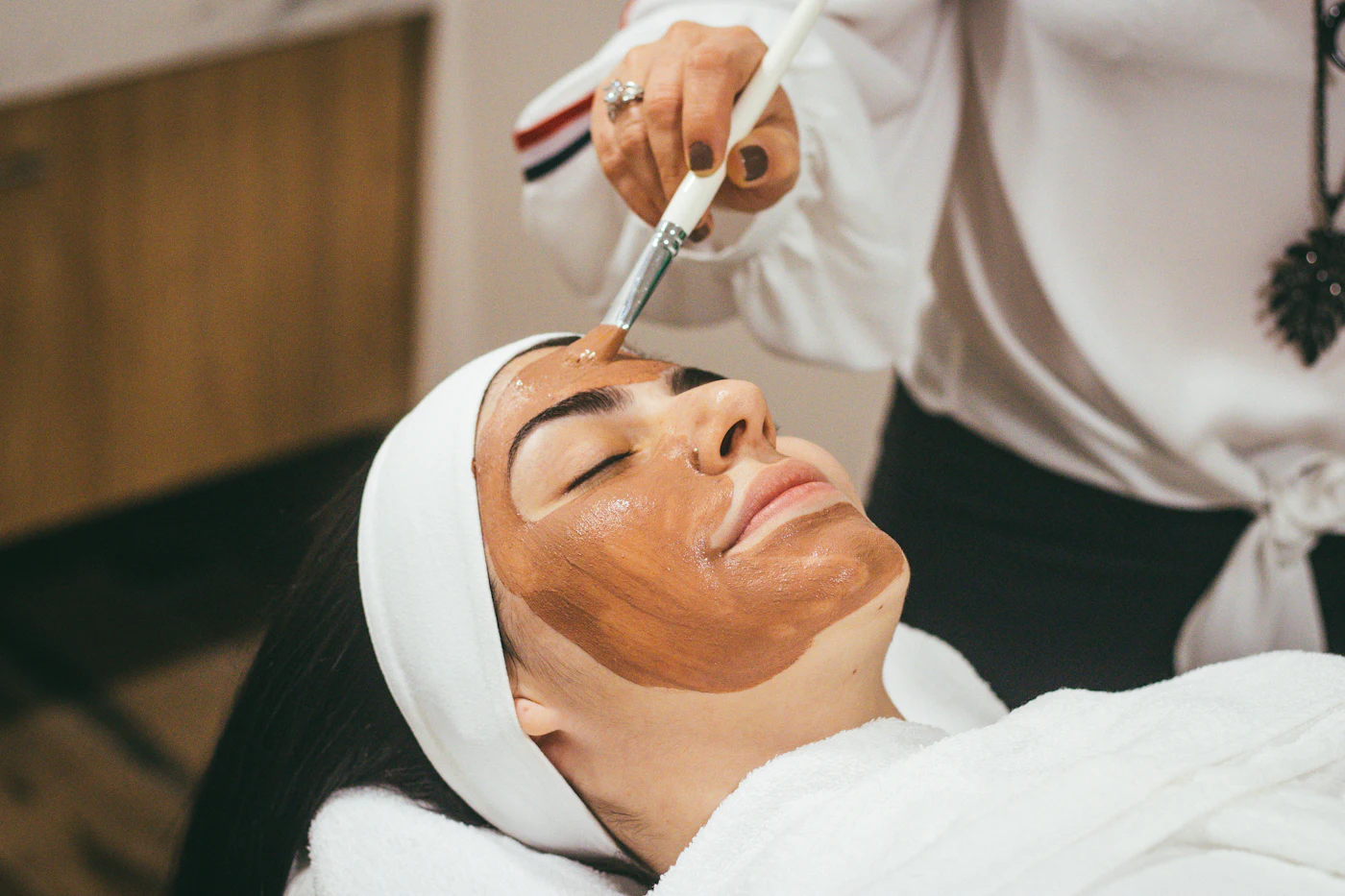 Placeholder photograph of a facial treatment